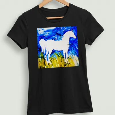 Abstract brushstroke design of a white horse silhouette against a blue background — printed on a women's shirt