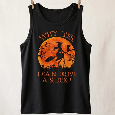 Whimsical watercolor print of a witch on a broomstick with a cat, featuring text about driving a stick. — printed on a tank top