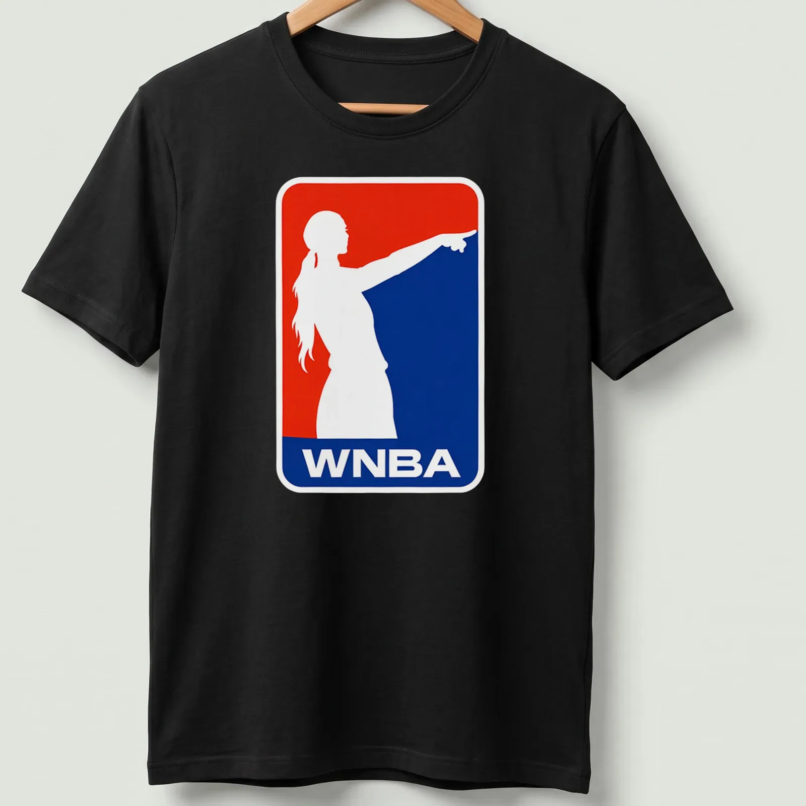 Bold WNBA T-shirt featuring a pointing silhouette of a female basketball player — printed on a unisex t-shirt