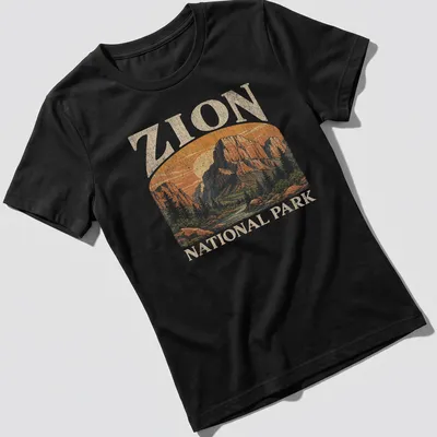 Vintage illustrated t-shirt featuring the Zion National Park landscape in warm colors — printed on a women's shirt